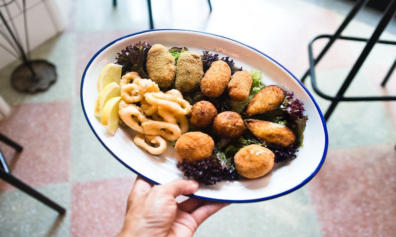 Assorted fried food at La Rosa Vermutería & Colmado